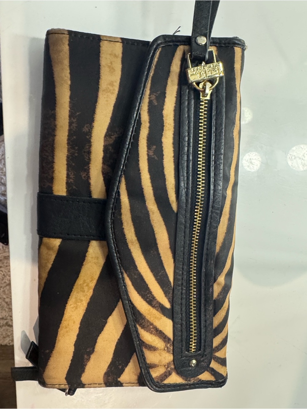 Nicole Miller Black and Tan Zebra-Print Wristlet Wallet